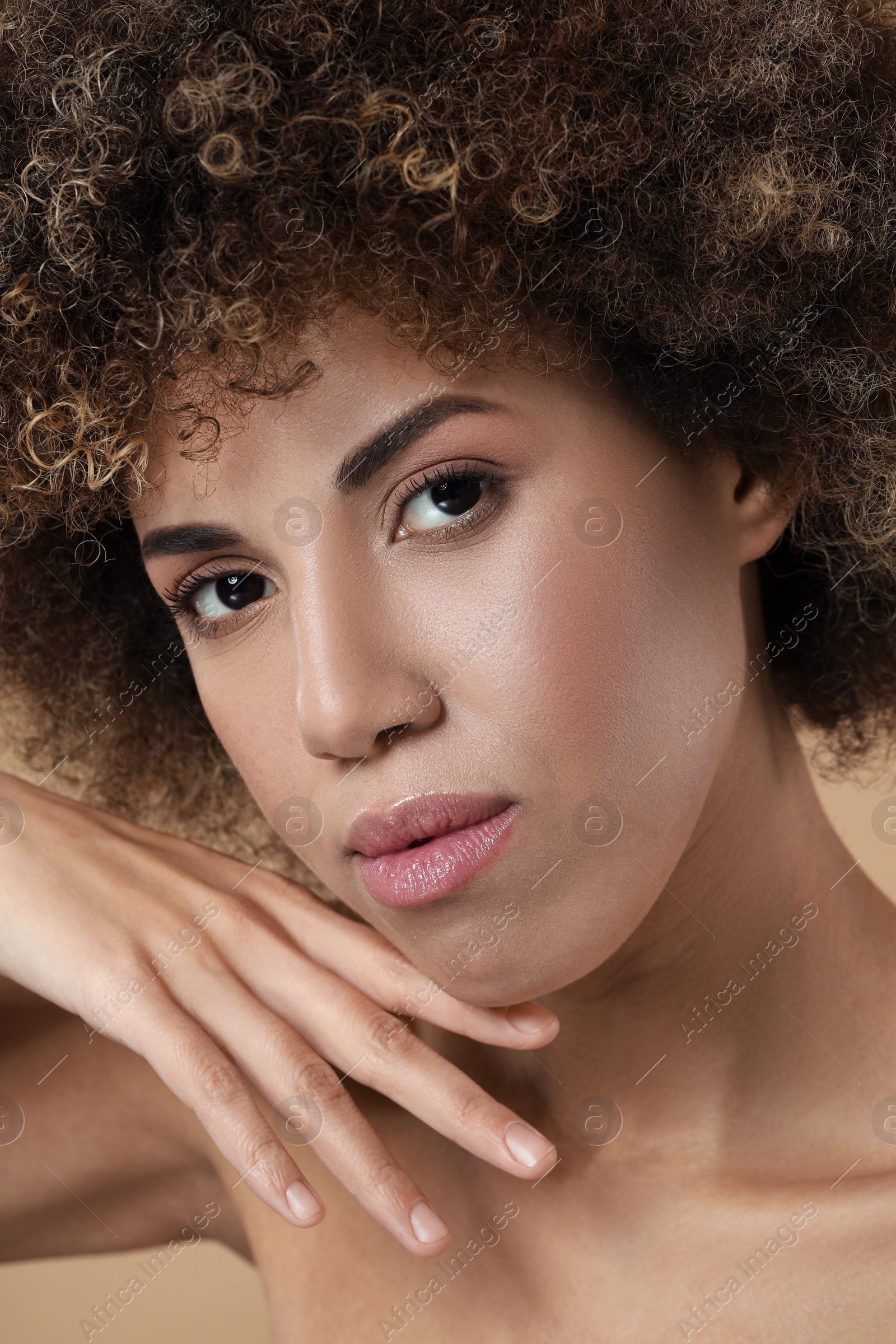 Photo of Beautiful woman with healthy skin on beige background