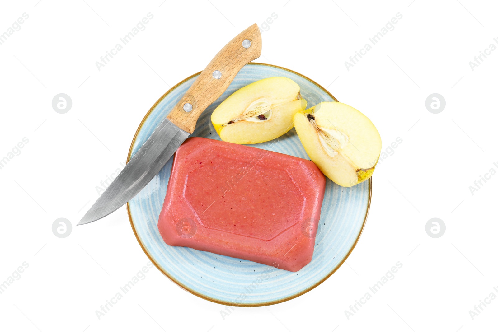 Photo of Delicious sweet quince paste, knife and fresh cut fruit isolated on white, top view