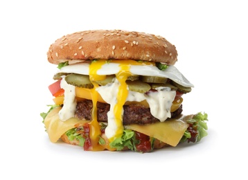 Photo of Tasty burger with fried egg on white background