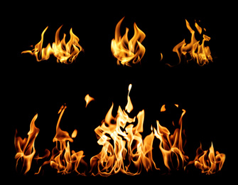 Image of Collection of bright fire flames on black background