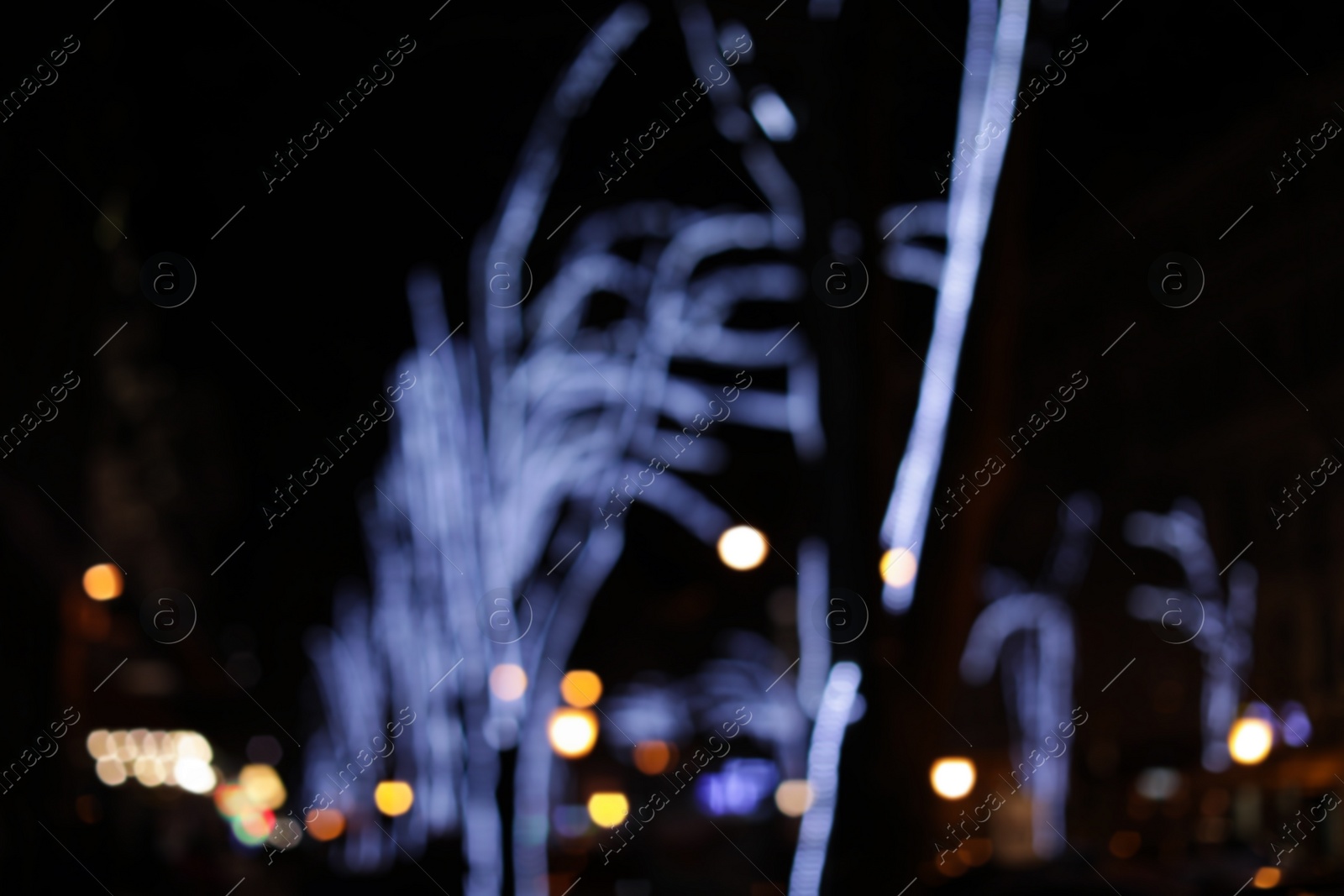 Photo of Beautiful street lights at night. Bokeh effect