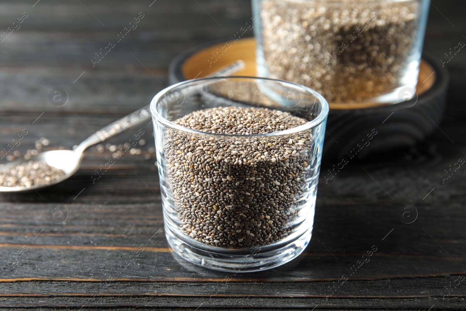 Photo of Composition with chia seeds on wooden background