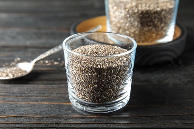 Photo of Composition with chia seeds on wooden background