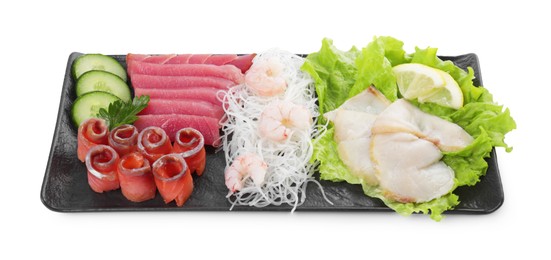 Photo of Sashimi set (raw slices of tuna, oily fish, salmon and shrimps) served with cucumber, funchosa, lettuce and lemon isolated on white
