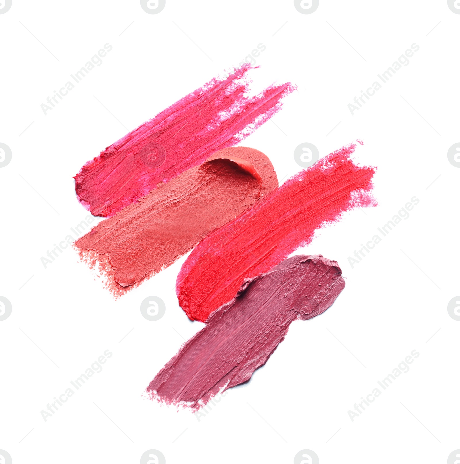 Photo of Lipstick smears isolated on white. Cosmetic product