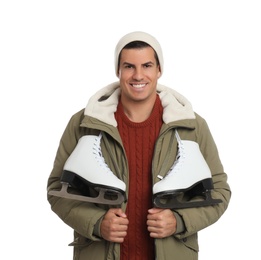 Happy man with ice skates on white background