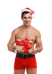 Sexy shirtless Santa Claus with gift on white background