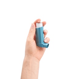 Photo of Woman holding asthma inhaler on white background, top view