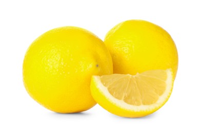 Photo of Cut and whole ripe lemons isolated on white