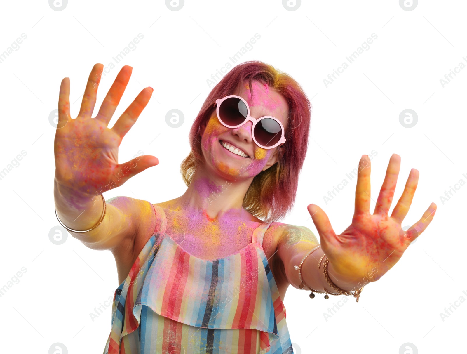 Photo of Woman covered with colorful powder dyes on white background. Holi festival celebration