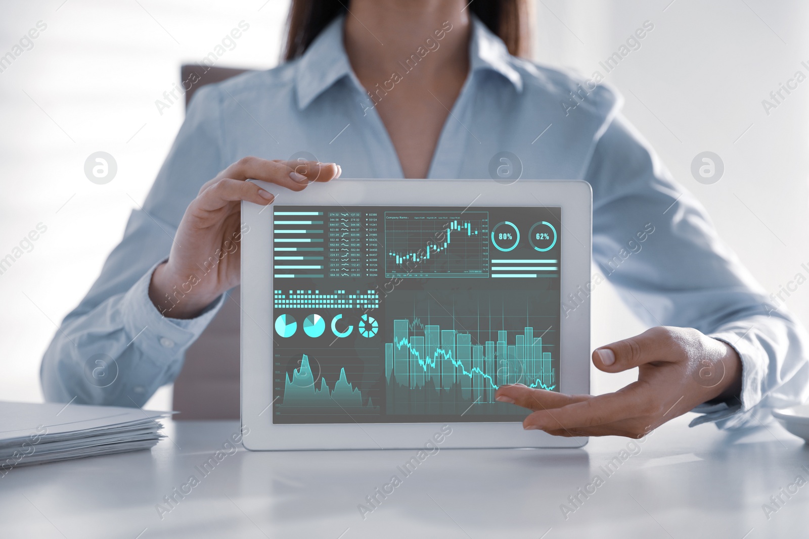 Image of Business analytics. Woman working with modern tablet in office, closeup