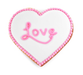 Beautiful heart shaped cookie with word Love on white background, top view. Valentine's day treat
