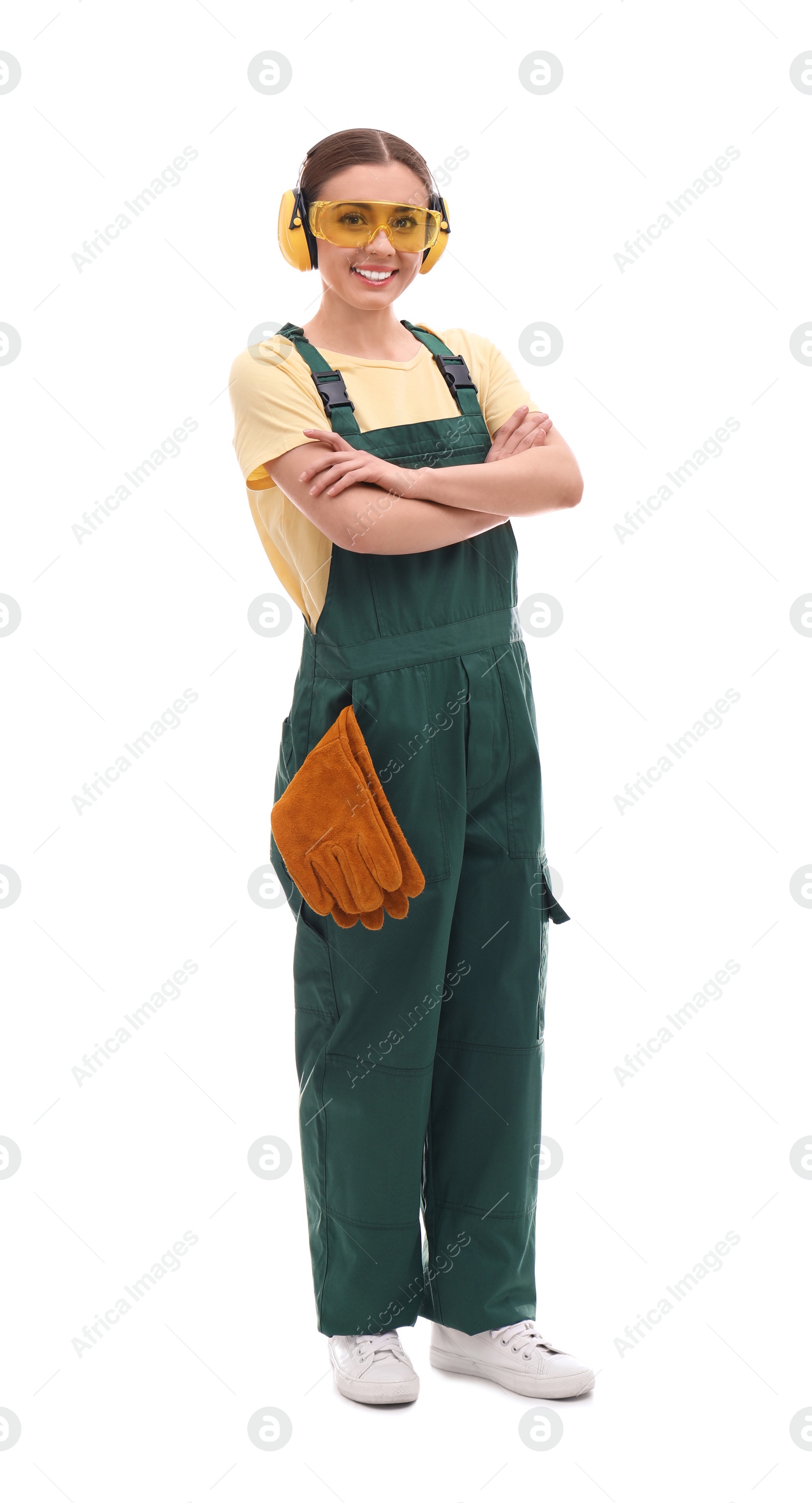 Photo of Female industrial worker in uniform on white background. Safety equipment