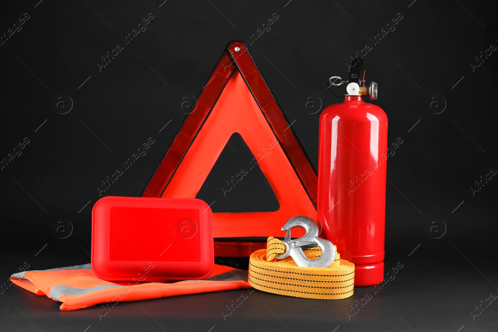 Photo of Set of car safety equipment on black background