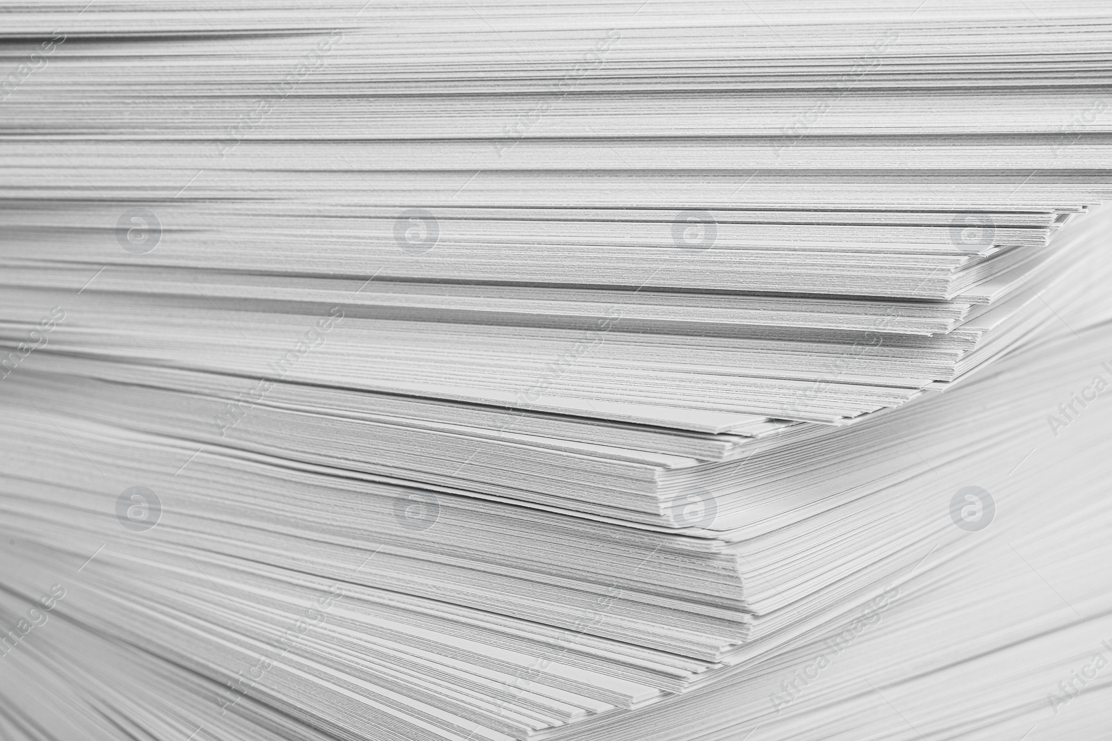 Photo of Stack of white paper sheets, closeup view