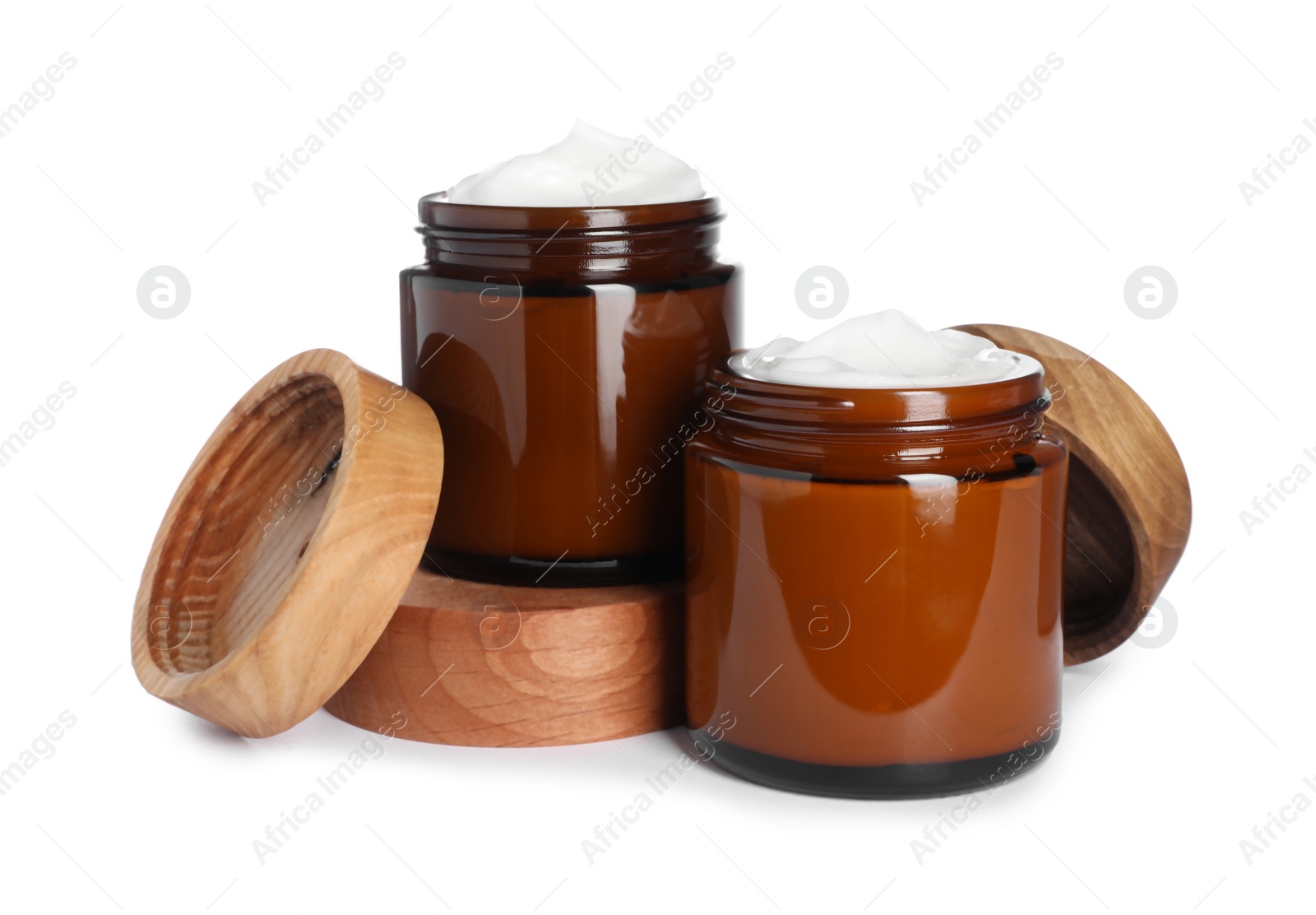 Photo of Jars of face cream isolated on white