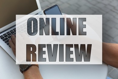 Image of Online review. Man using laptop and mobile phone to leave feedback, closeup