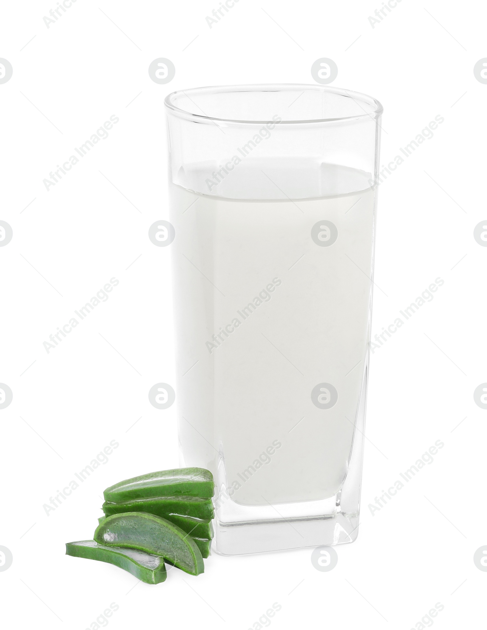 Photo of Fresh aloe juice in glass and cut leaves isolated on white