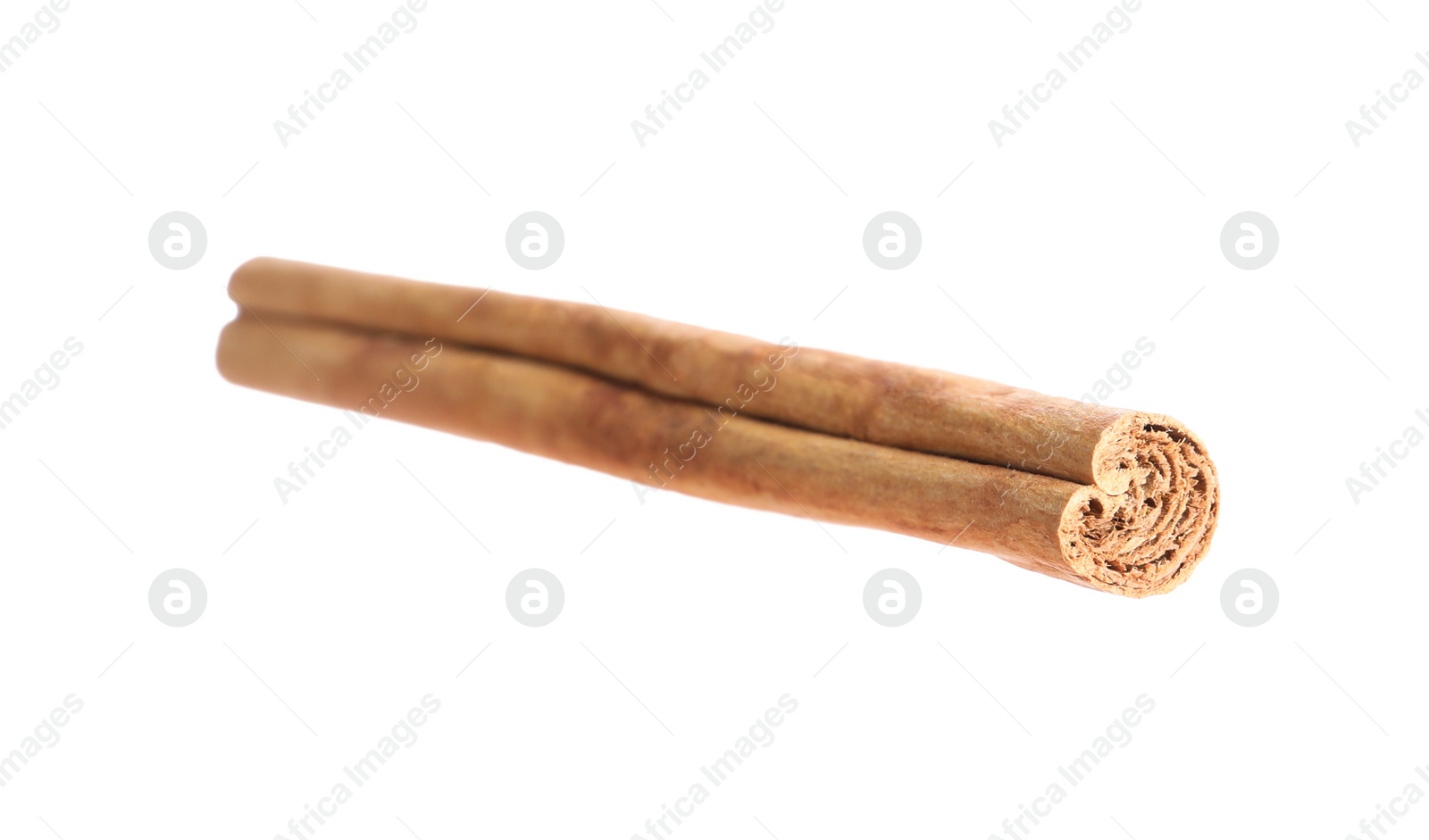 Photo of One aromatic cinnamon stick isolated on white