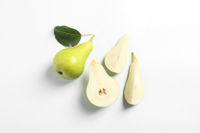 Photo of Ripe juicy pears on white background, top view