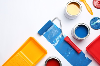 Photo of Composition with paint cans and space for text on white background