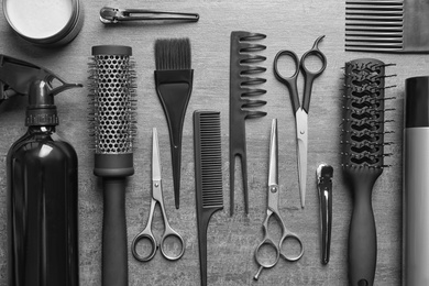 Photo of Professional hairdresser set on gray table