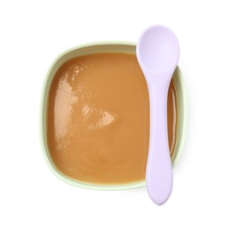 Photo of Tasty baby food in bowl and spoon isolated on white, top view