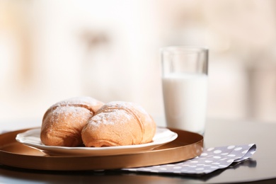 Photo of Tasty breakfast with fresh croissants on table