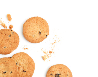 Photo of Tasty homemade cookies with raisins on white background, top view