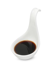 Photo of Tasty soy sauce in gravy boat isolated on white