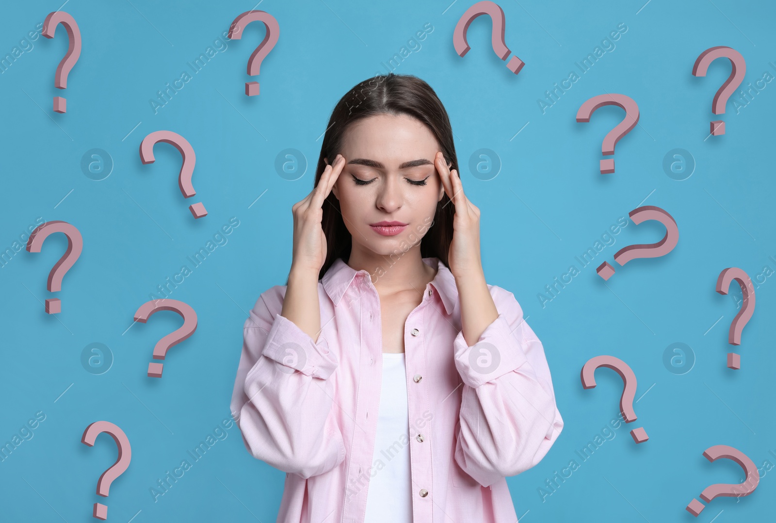 Image of Amnesia. Confused young woman and question marks on light blue background