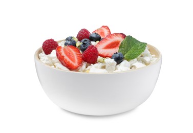 Fresh cottage cheese with berries and mint in bowl isolated on white