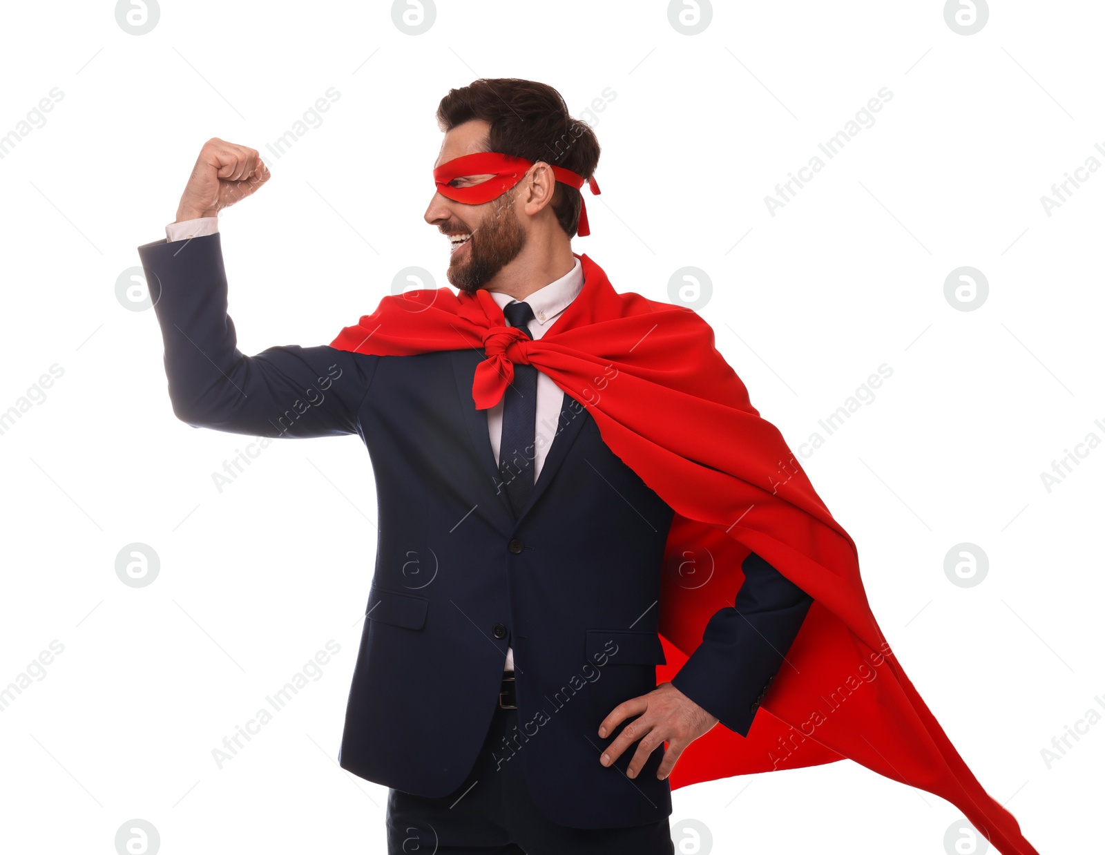 Photo of Happy businessman wearing red superhero cape and mask on white background