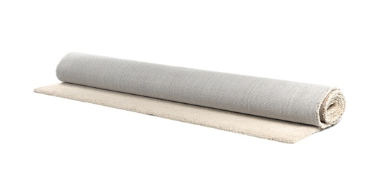 Rolled soft carpet on white background. Interior element