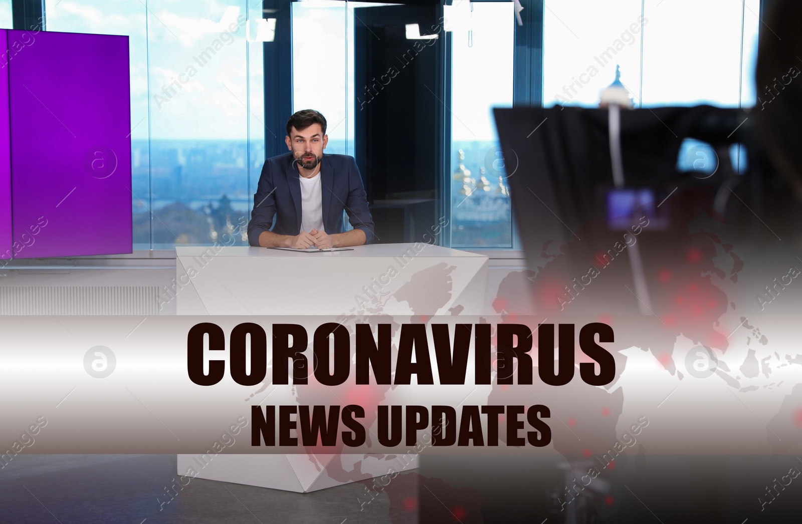 Image of Presenter working in studio. Coronavirus pandemic - latest updates