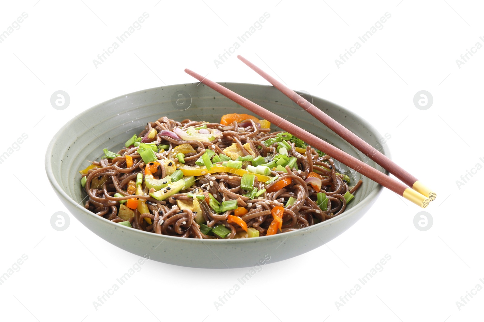 Photo of Stir-fry. Delicious cooked noodles with chicken in bowl and chopsticks isolated on white