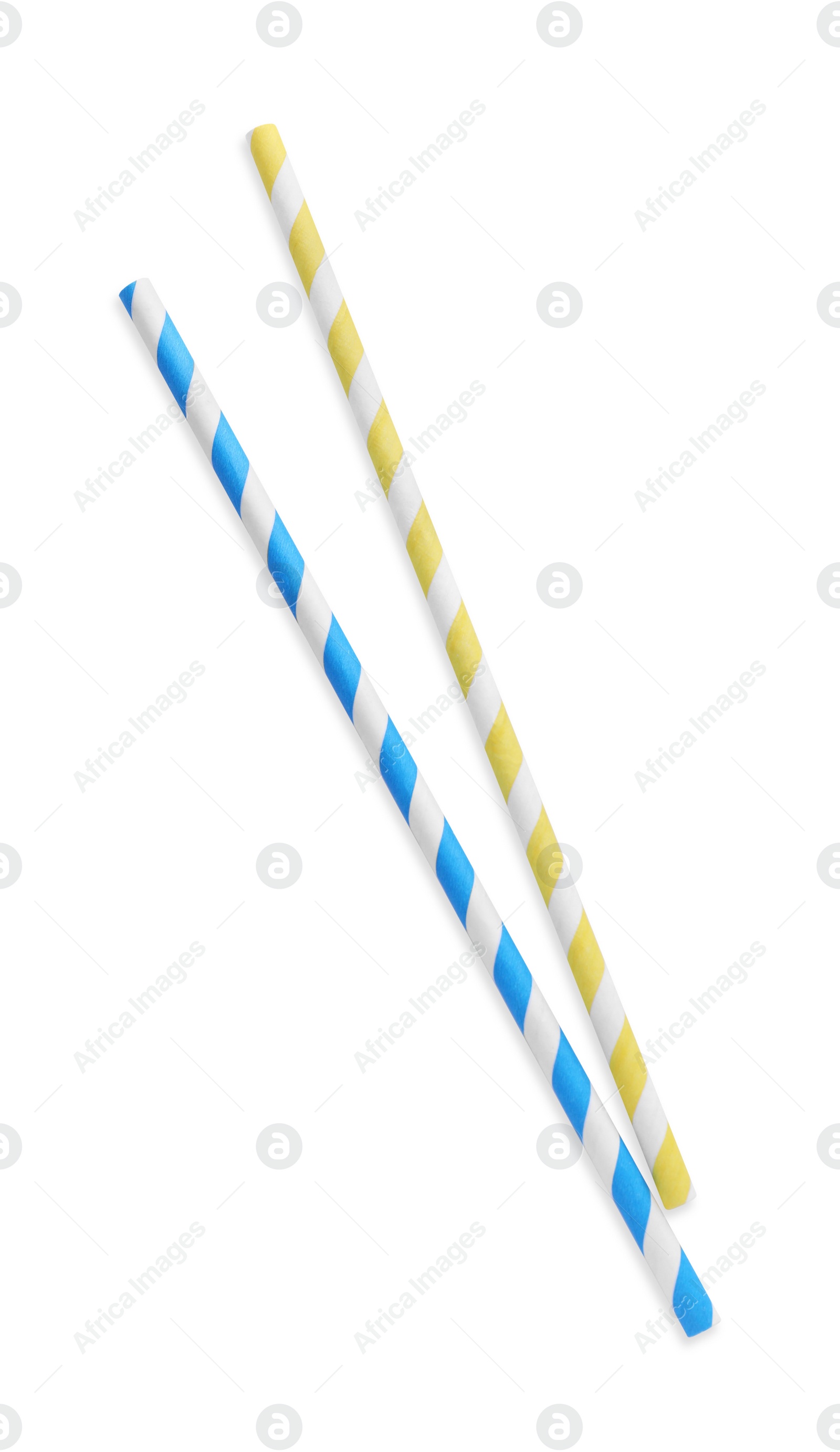 Photo of Different paper cocktail straws on white background