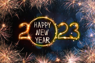 Image of Bright text Happy New 2023 Year made of firework on dark background. Greeting card design