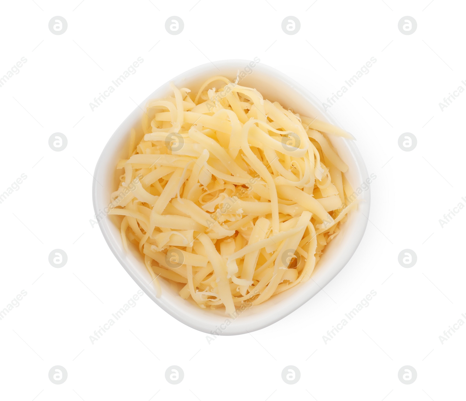 Photo of Tasty grated cheese in bowl isolated on white, top view