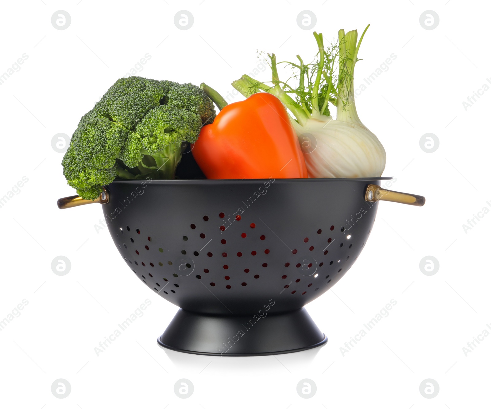 Photo of Colander with fresh vegetables isolated on white