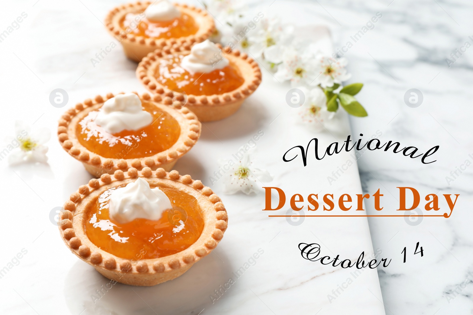 Image of National Dessert Day, October 14. Tasty tartlets with jam on white marble table