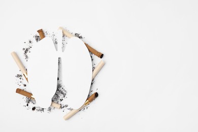 No smoking concept. Paper lungs and cigarettes on white background, flat lay with space for text