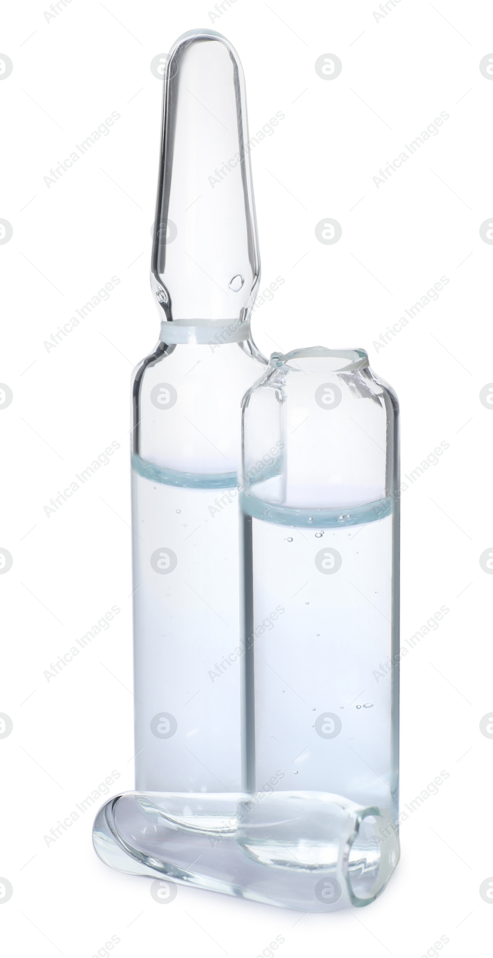 Photo of Open and closed glass ampoules with pharmaceutical product on white background