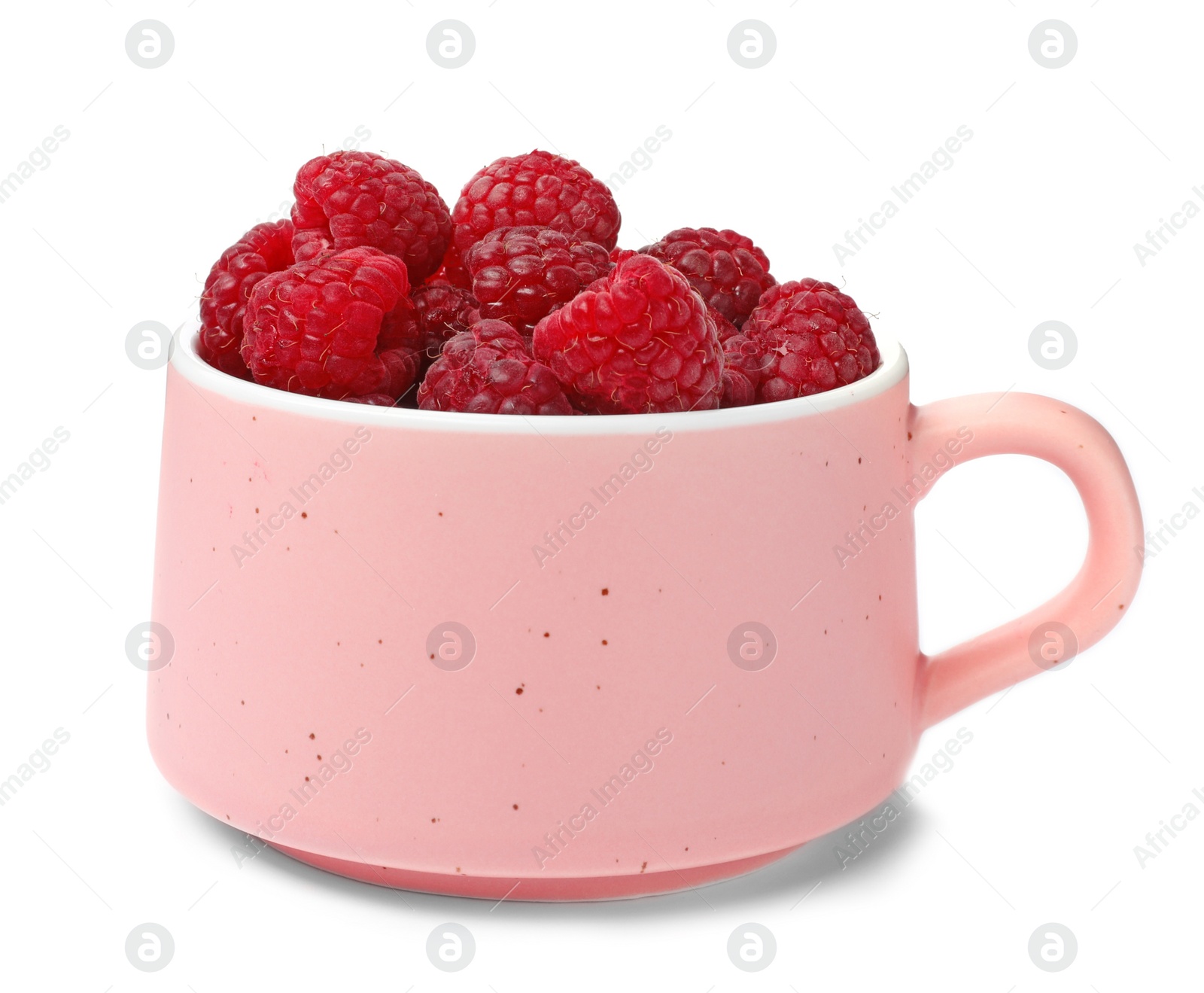 Photo of Mug with ripe raspberries on white background