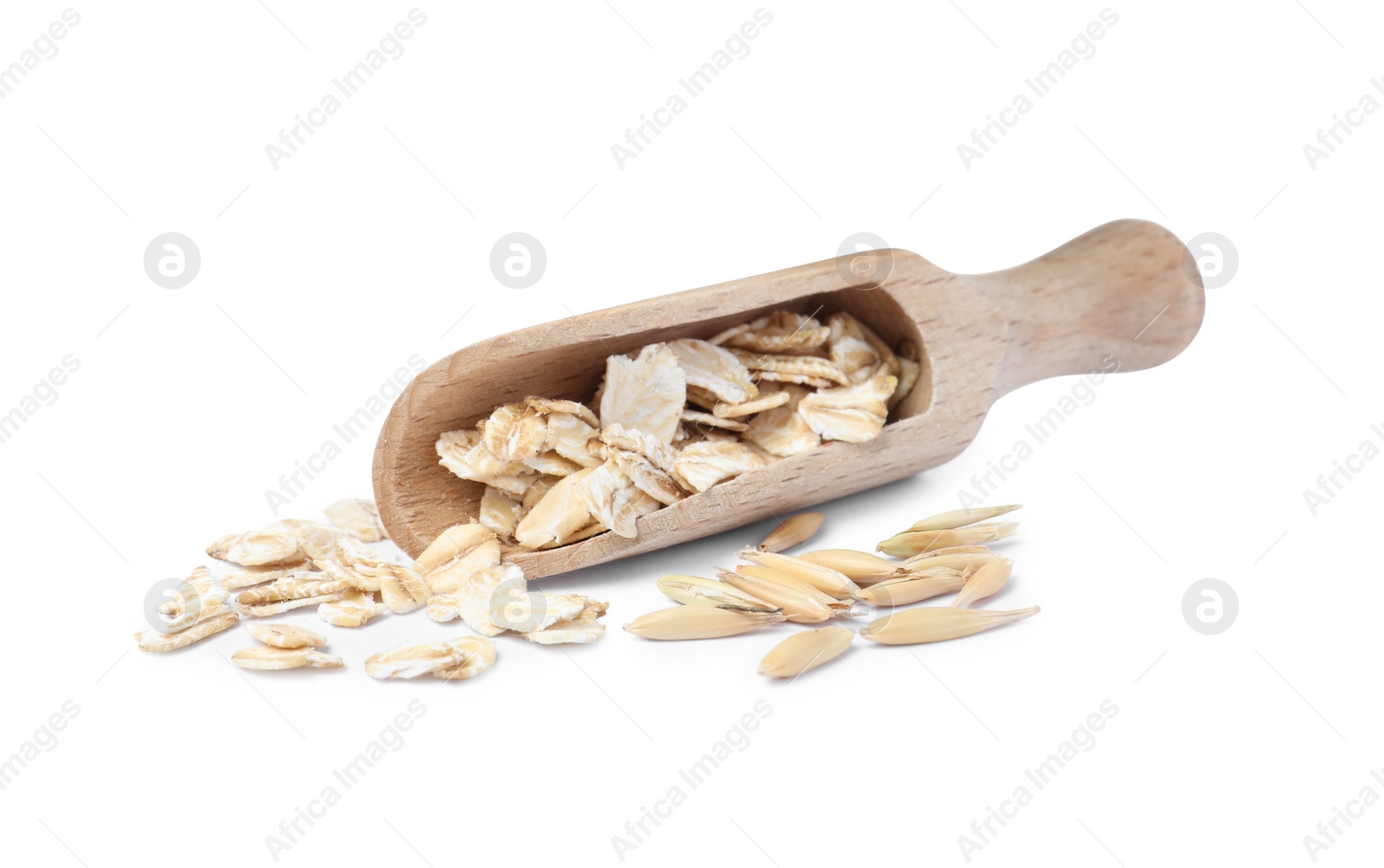 Photo of Raw oatmeal and wooden scoop on white background