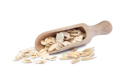 Photo of Raw oatmeal and wooden scoop on white background