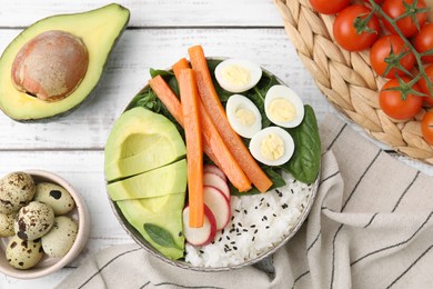 Photo of Delicious poke bowl and ingredients on white wooden table, flat lay