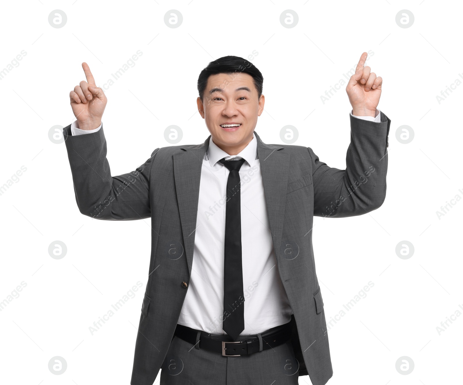 Photo of Businessman in suit pointing at something on white background