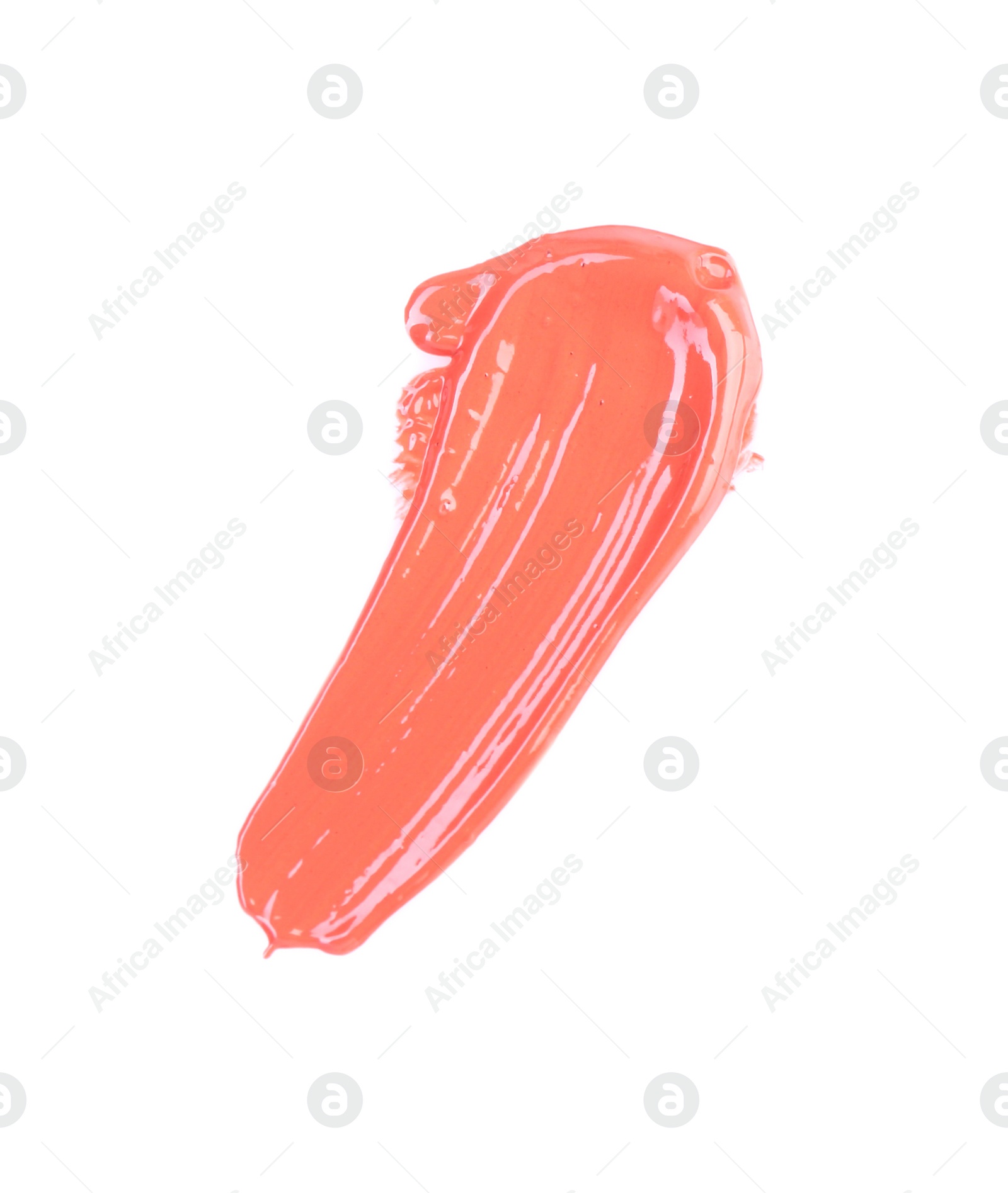 Photo of Stroke of color lip gloss isolated on white