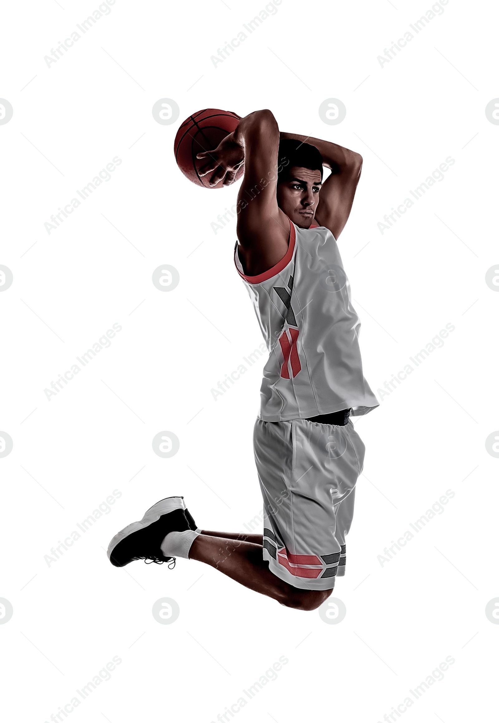 Image of Silhouette of professional sportsman playing basketball on white background